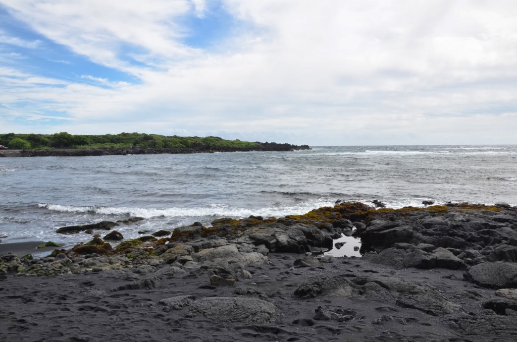 black sand beach with ocean